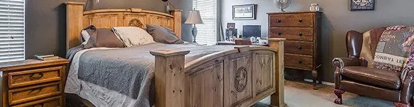 A primary bedroom staged by Gina Hoover before photography for a Burleson, Texas listing